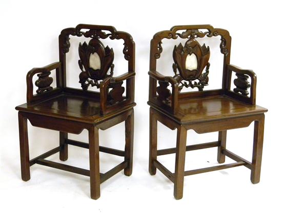 Pair of elaborately carved blackwood 120d45