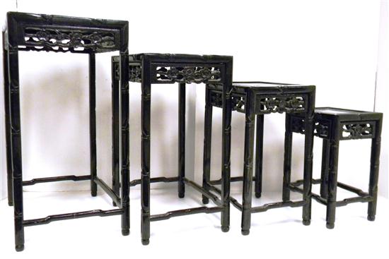 Nest of four Oriental stands  black