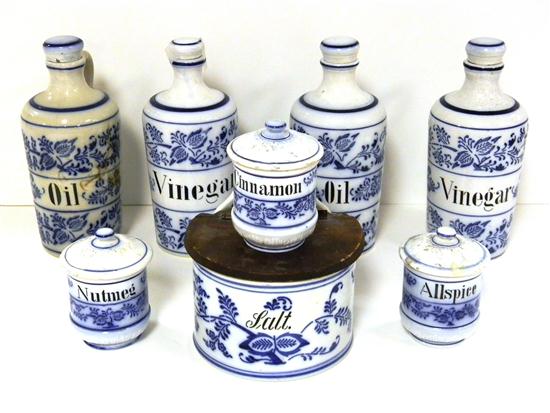 Three 4 spice blue and white canisters;