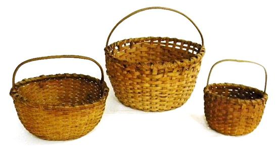 Three splint baskets  arched handles