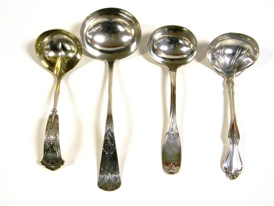 Four sterling and coin ladles  120e43