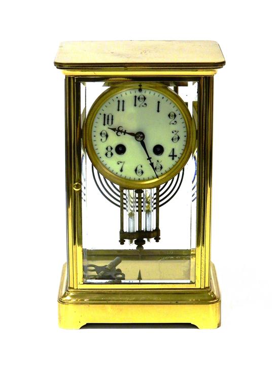 Brass mantle clock with Arabic numerals