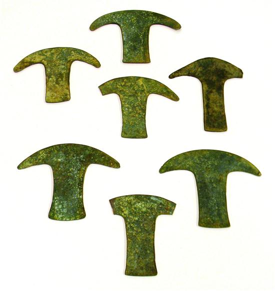 Seven ancient t shaped metal fragments 120f90