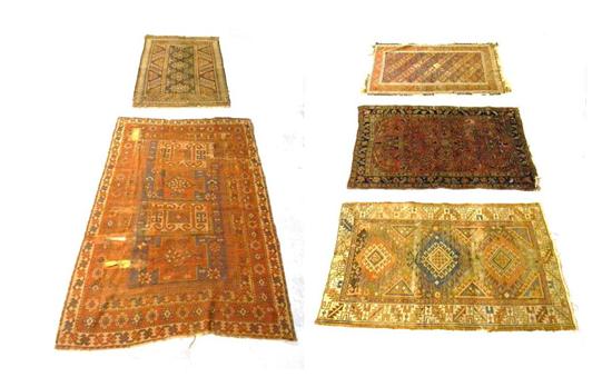 Five small antique scatter rugs: