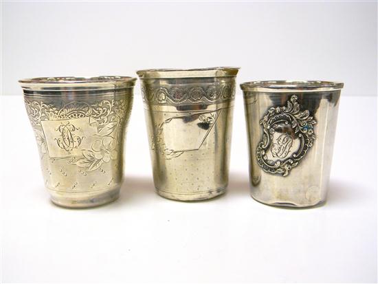 Three silver tumblers  all with