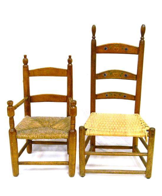 Two children-sized wooden chairs: