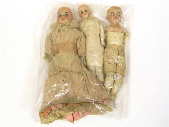 Three bisque head dolls in as found
