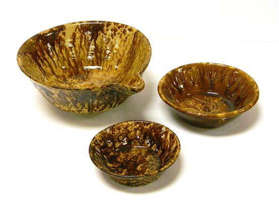 Three Rockingham glazed bowls  1210da