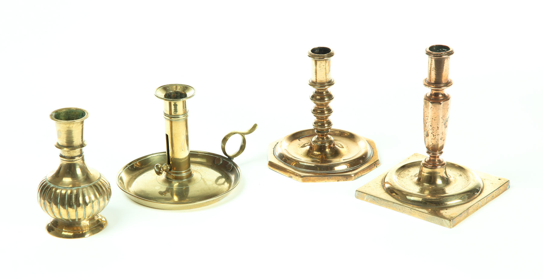 THREE BRASS CANDLESTICKS AND VASE.