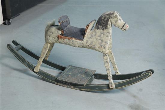 ROCKING HORSE. Folksy carved and polychrome