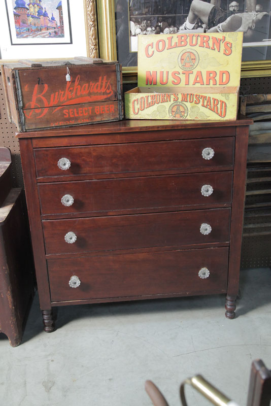 CHEST OF DRAWERS. Walnut having four