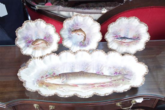 FOUR PIECE LIMOGES FISH SET. Handpainted