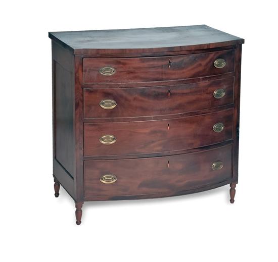 BOWFRONT CHEST OF DRAWERS. Mahogany