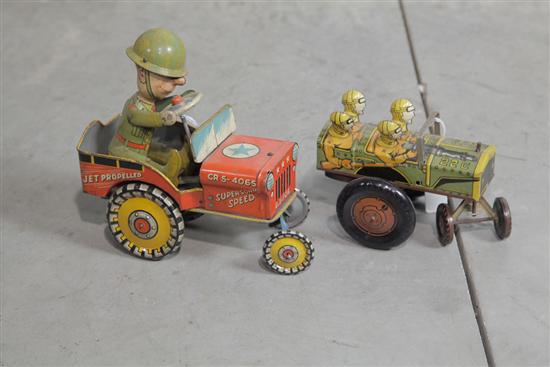 TWO TIN WINDUP TOYS. Unique Art G.I.