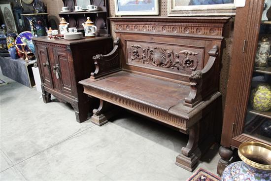 HALL BENCH. Oak with a lift seat.