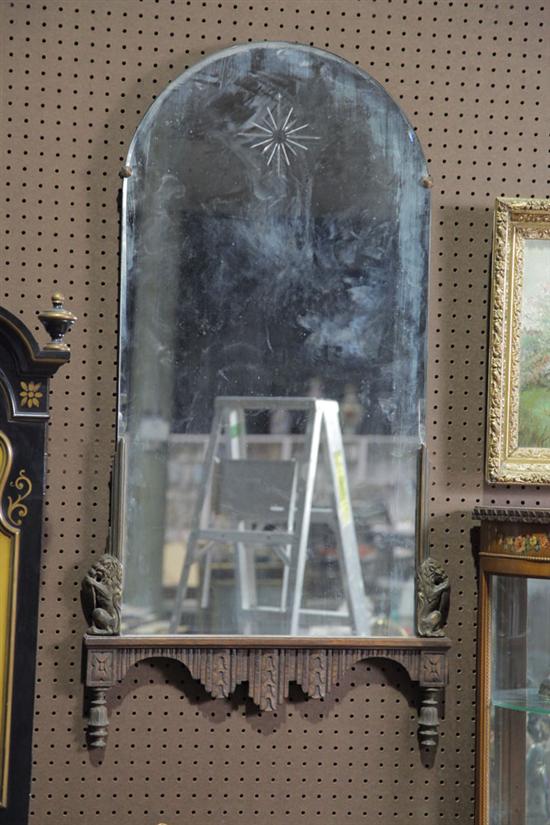 MIRROR. Arched top having cut star decoration