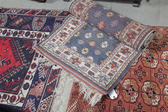 THREE ORIENTAL AREA RUGS. Ivory