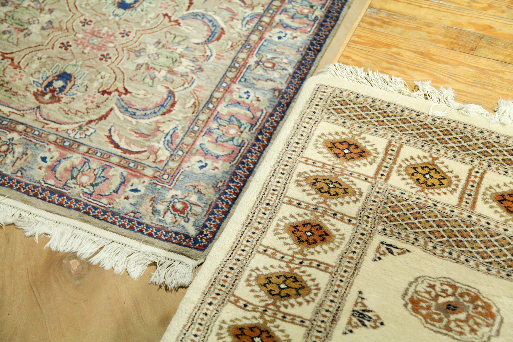 TWO ORIENTAL STYLE AREA RUGS. 