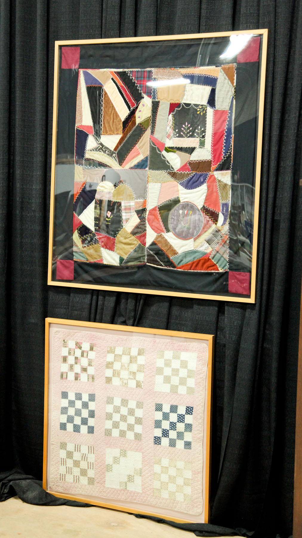 TWO FRAMED QUILTS.  American  late