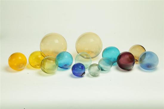 FOURTEEN GLASS FLOAT BALLS.  American