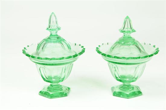 TWO COVERED CUT GLASS CANDY BOWLS.