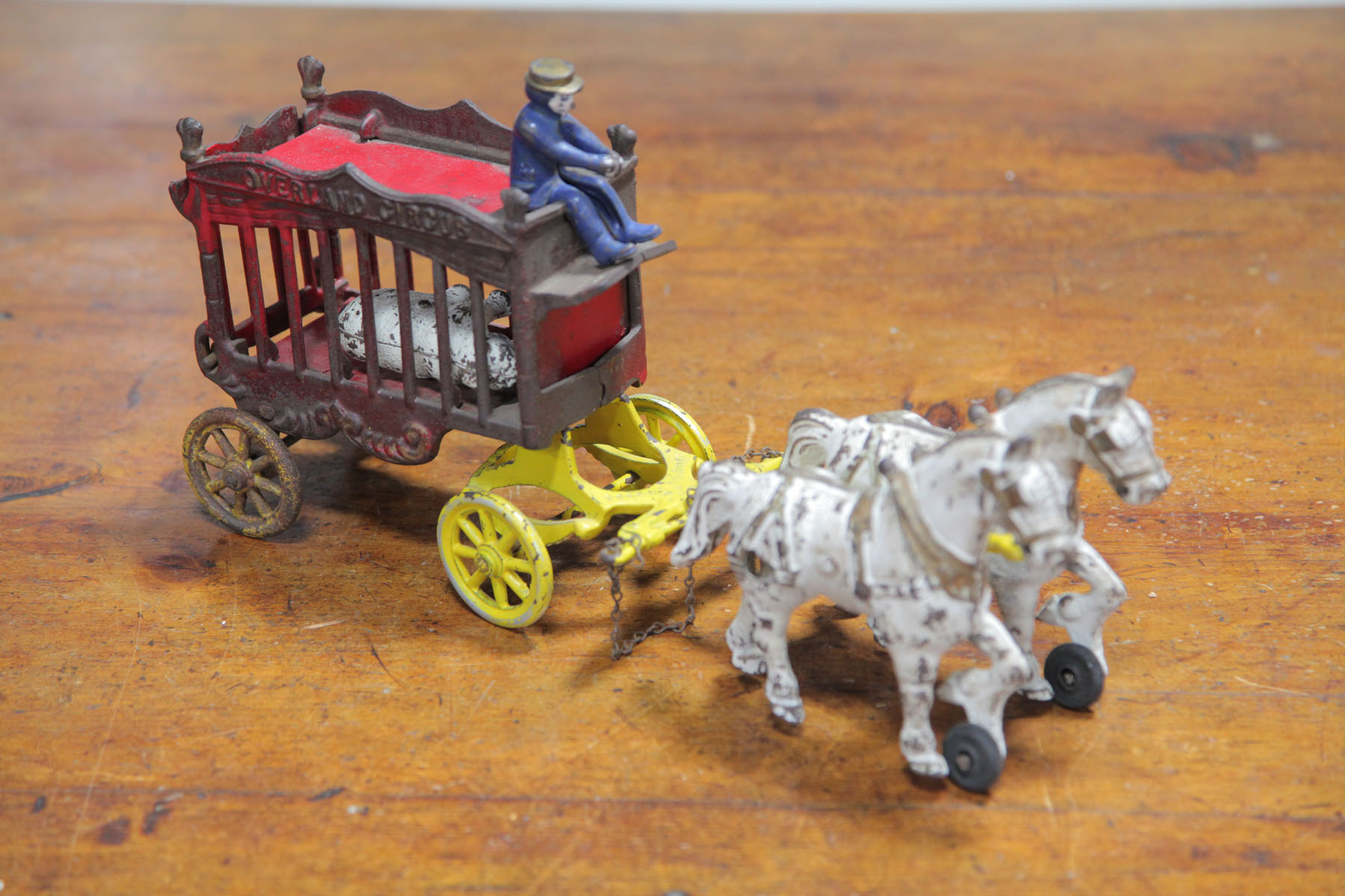 CAST IRON OVERLAND CIRCUS WAGON.