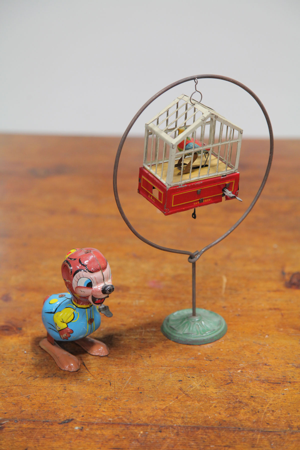 TWO TIN WIND-UP TOYS.  German and