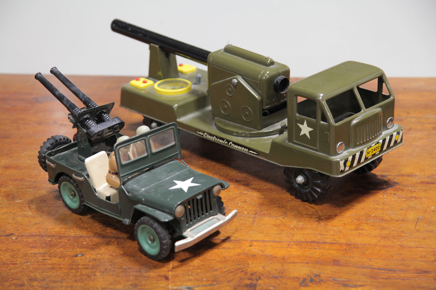 TWO ARMY TRUCKS.  American and Japanese