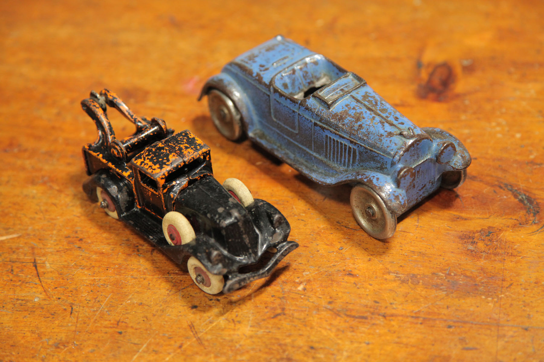 TWO CAST IRON AUTOMOBILES.  American