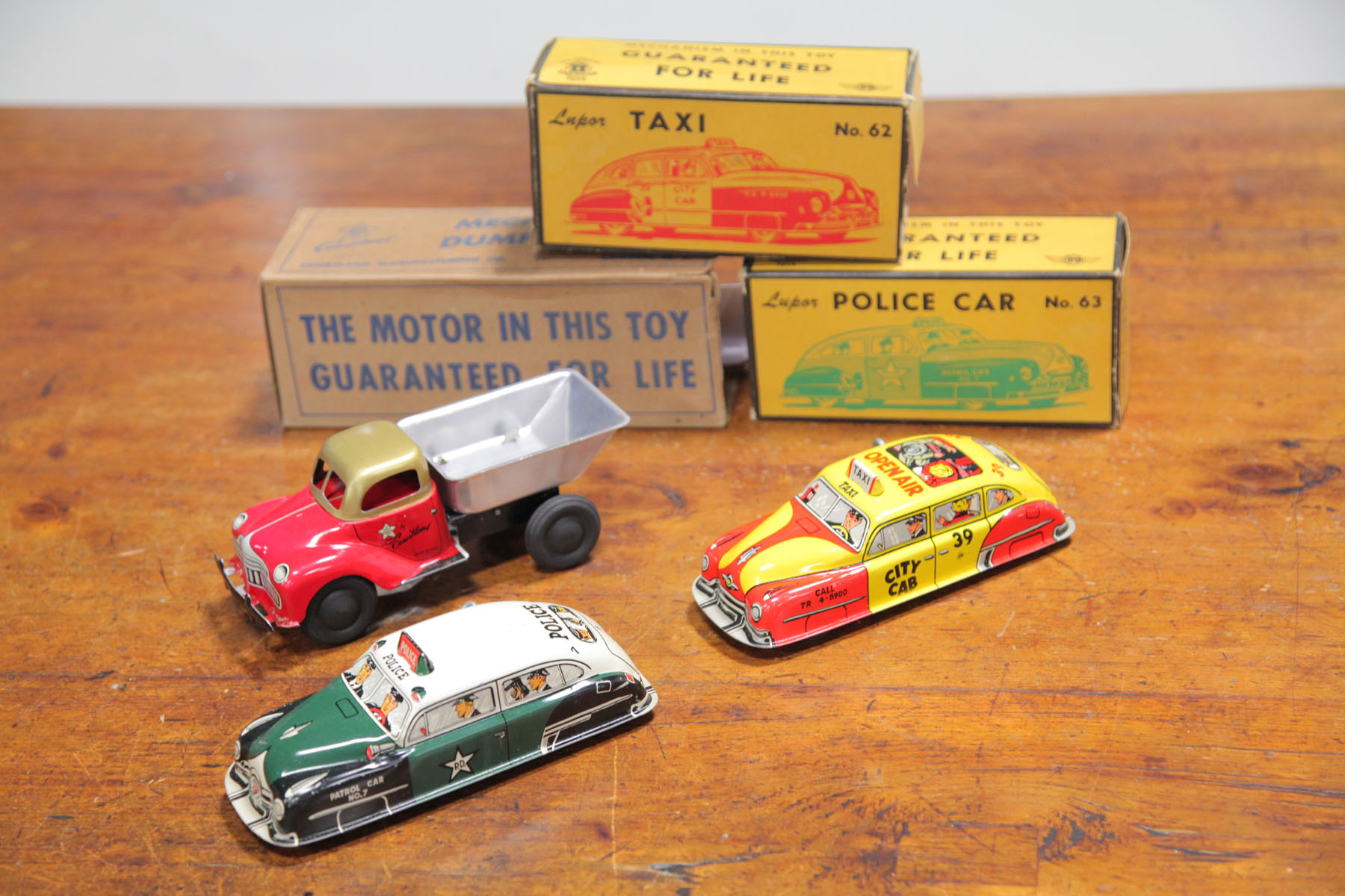 THREE TIN WIND UP VEHICLES WITH 122d65