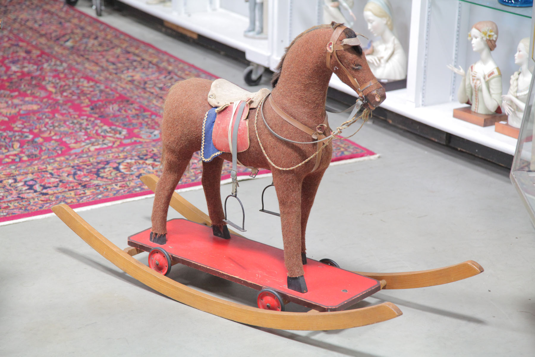 COMBINATION ROCKING HORSE AND PULL TOY.