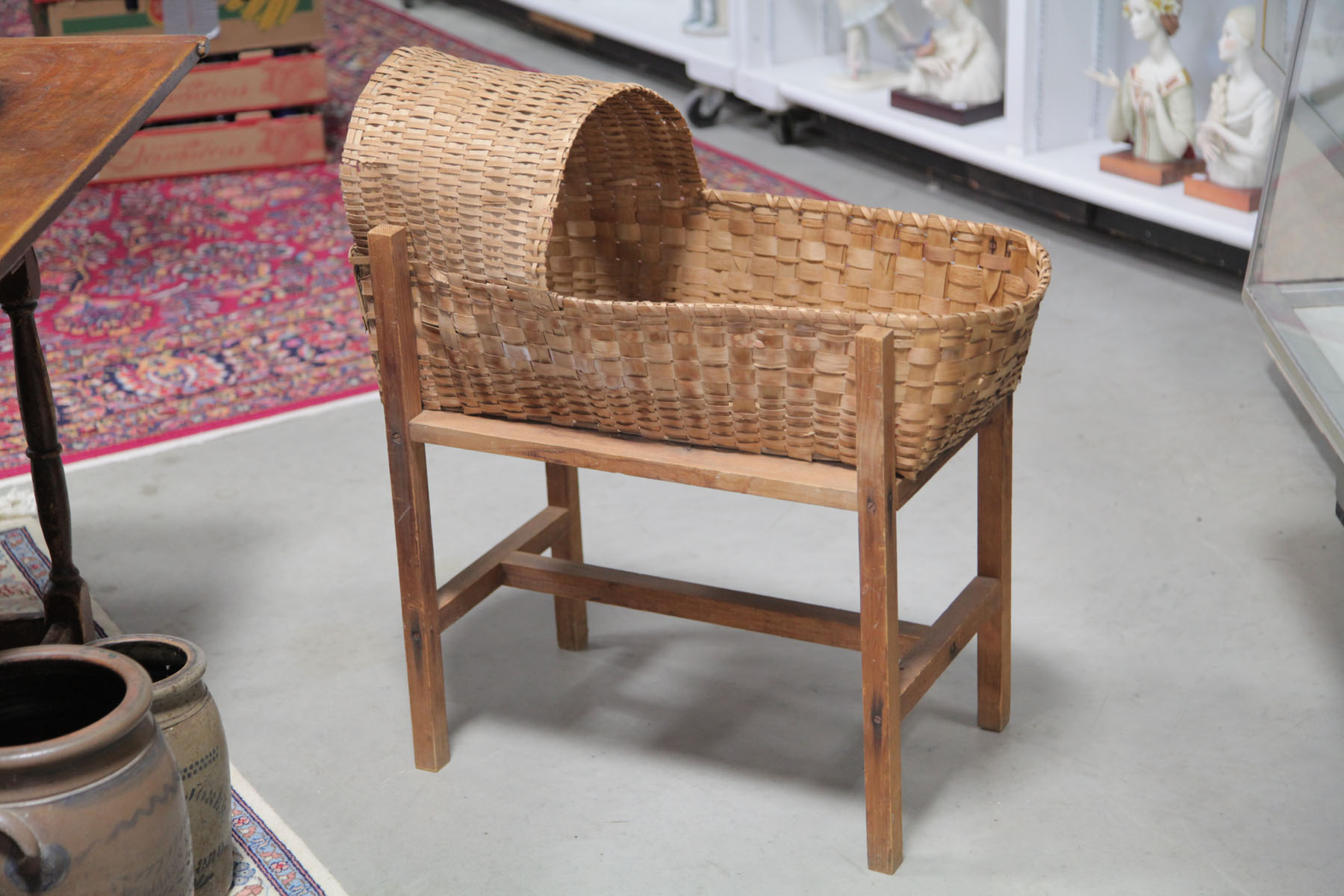 WOVEN CRADLE AND STAND.  American