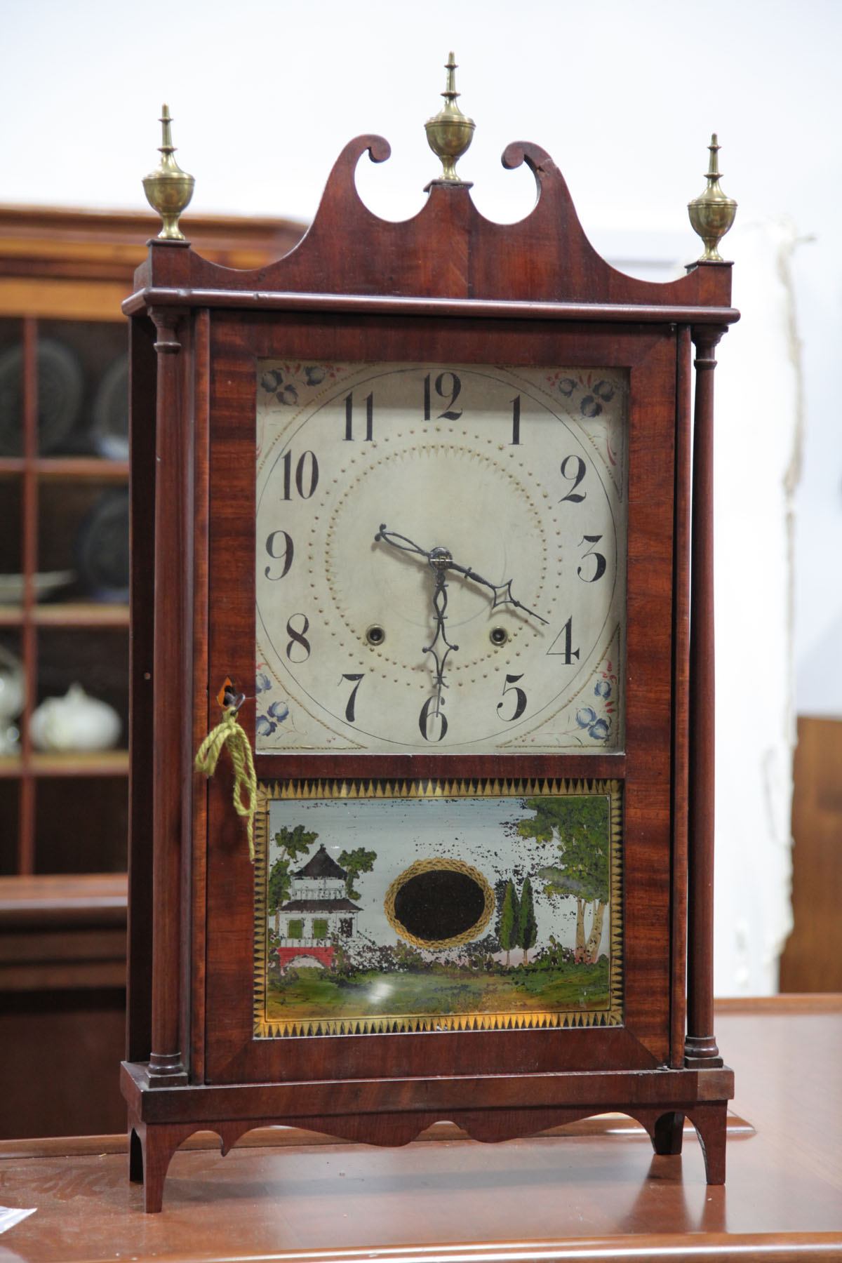 ELI TERRY PILLAR AND SCROLL CLOCK.