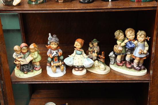 FIVE HUMMEL FIGURES. Boy and girl