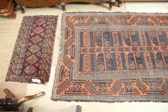 TWO ORIENTAL RUGS. An area rug