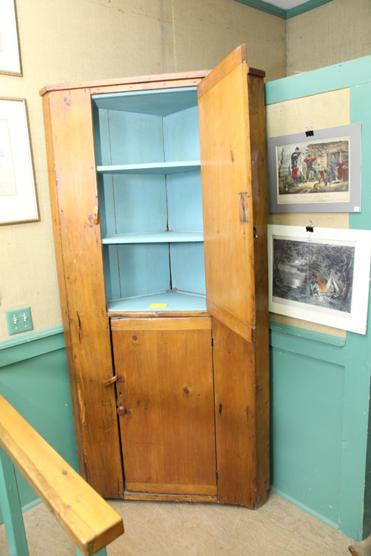 CORNER CUPBOARD. One piece pine cupboard