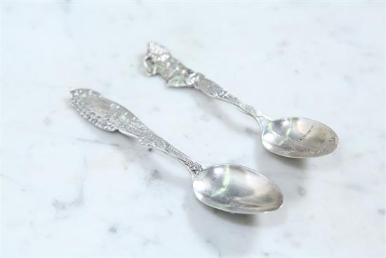 TWO STERLING SOUVENIR SPOONS. One