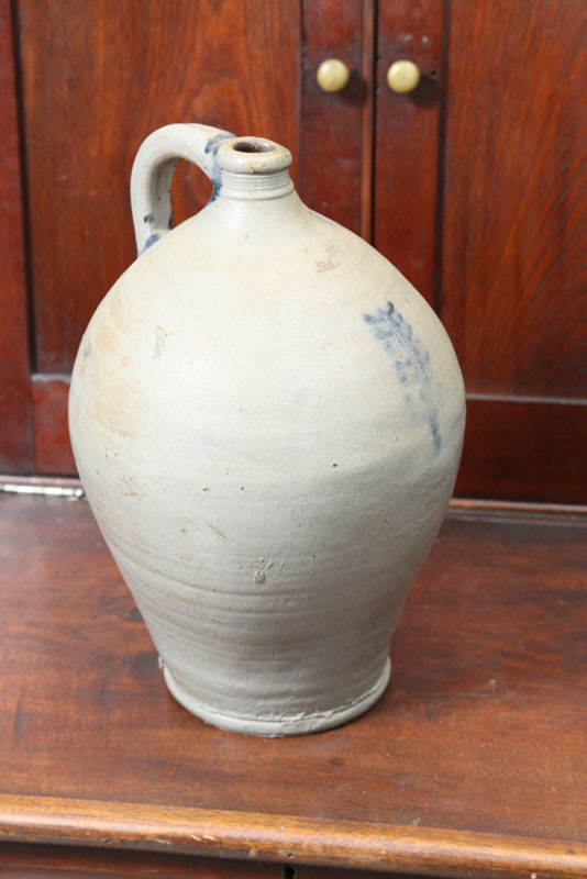 STONEWARE JUG. Ovoid form with handle