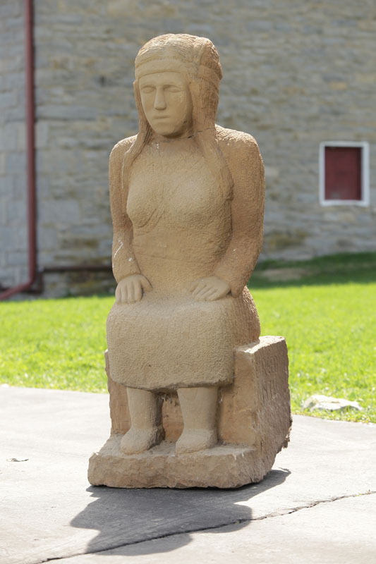 SEATED INDIAN WOMAN WITH PAPOOSE