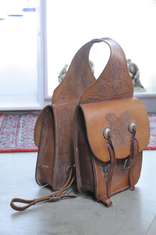 LEATHER SADDLE BAGS. Tooled bags