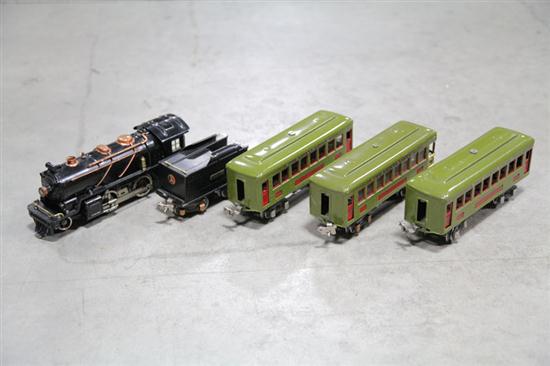 FIVE LIONEL TRAIN CARS. 262E Locomotive