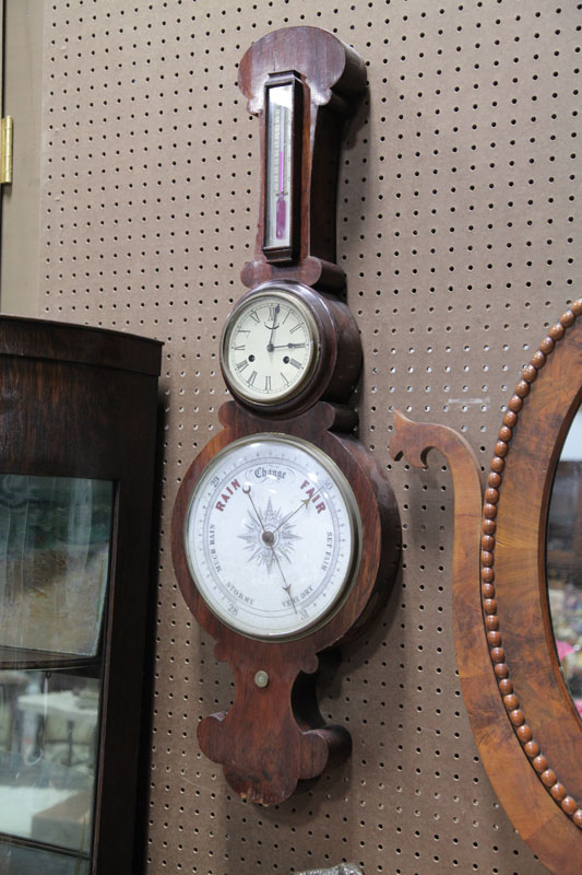 BAROMETER WITH CLOCK AND THERMOMETER.
