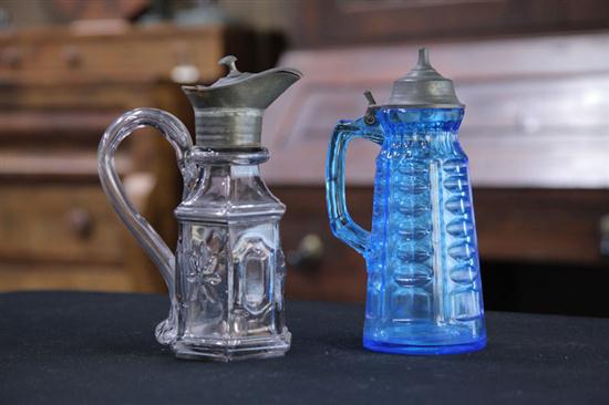 TWO ART GLASS SYRUPS. A Hobbs Hercules