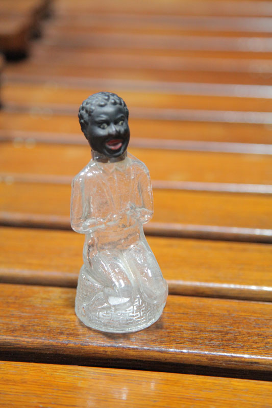 AFRICAN AMERICAN FIGURAL BOTTLE.