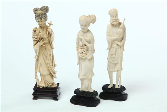 THREE IVORY CARVINGS.  China  early