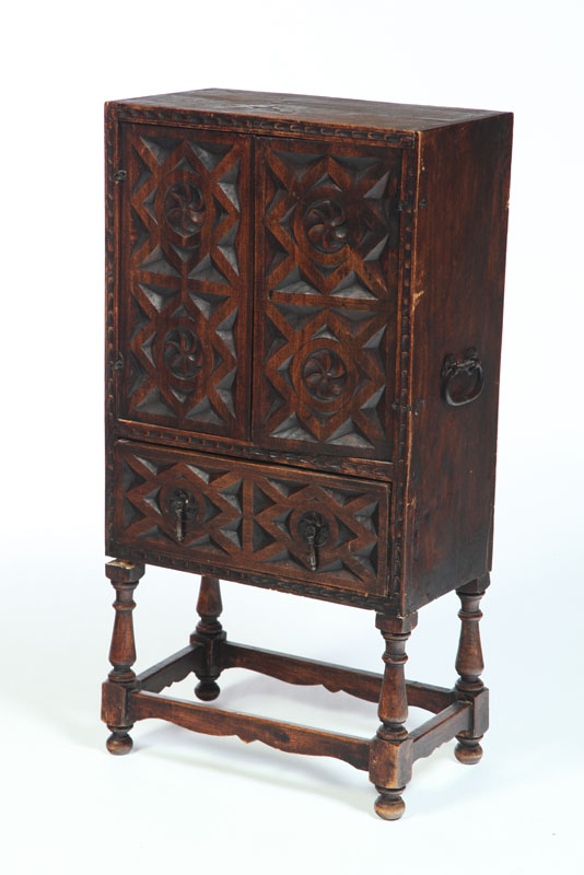 CARVED CUPBOARD ON STAND.  England