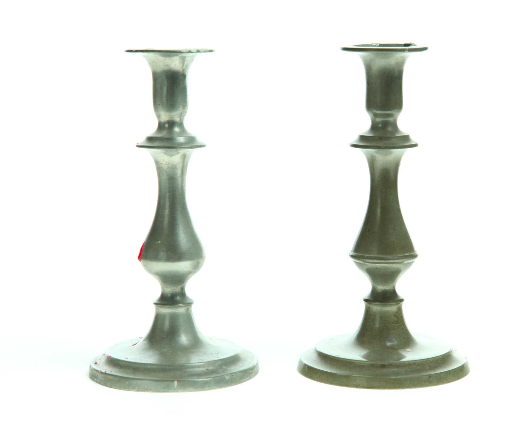 TWO PEWTER CANDLESTICKS.  Flagg and