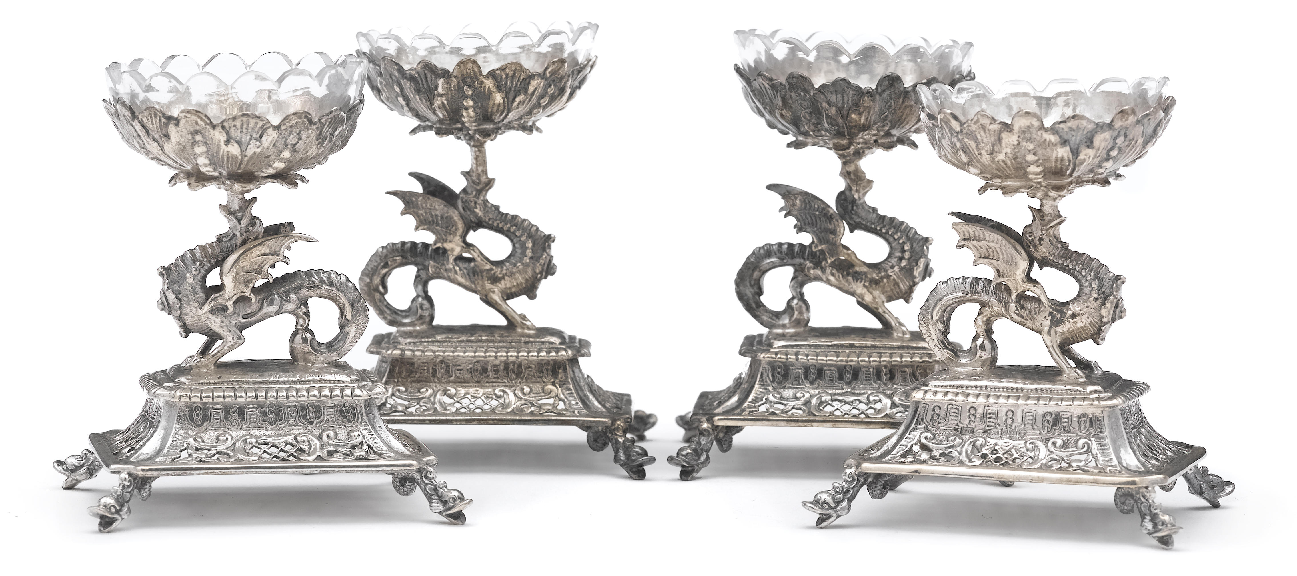 A sterling set of four figural