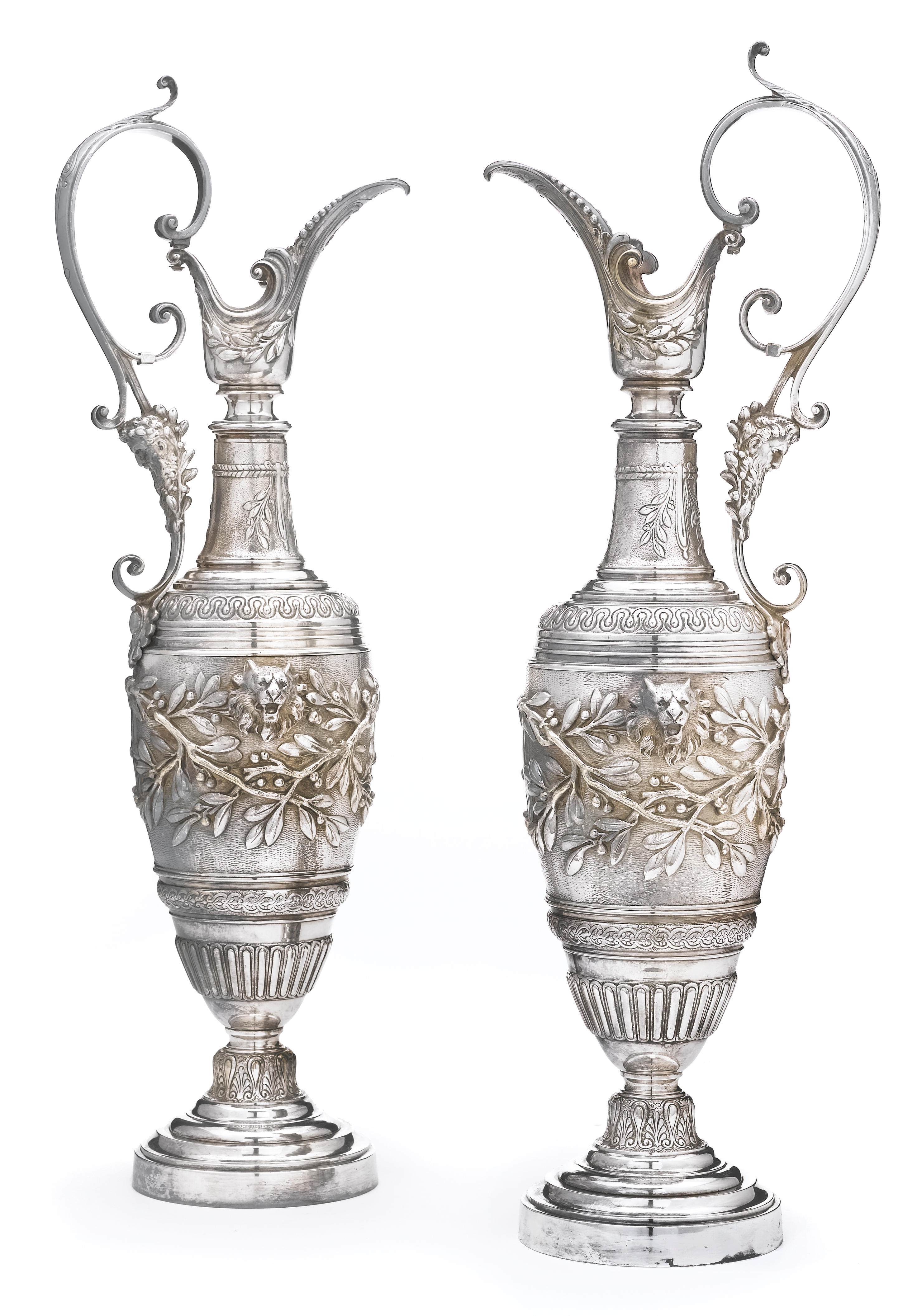 A pair of silver plated garnitures