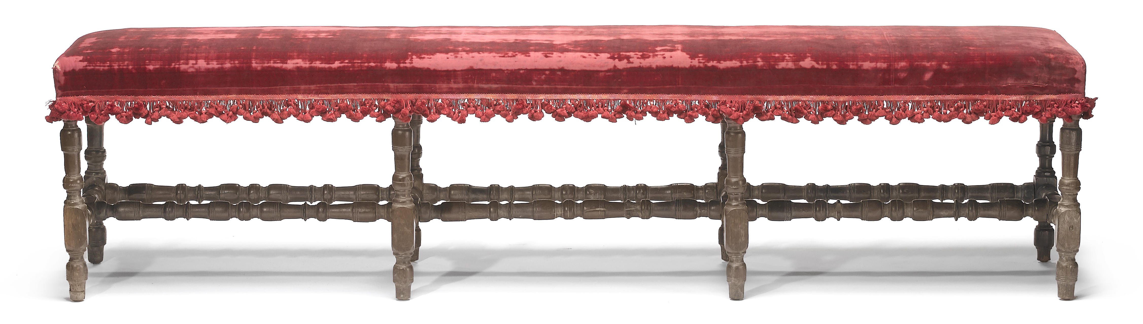 A Continental Baroque walnut bench